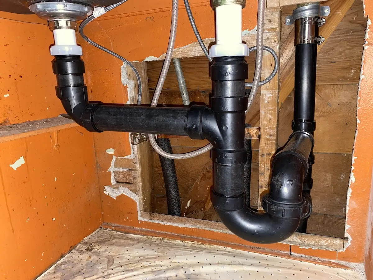 Professional Garbage Disposal Repair equipment and tools on the job in Frederick